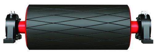 Pulley with a black diamond-grooved rubber lagging, mounted on two bearing blocks